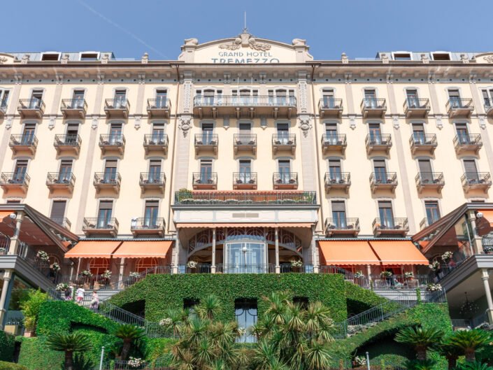 The Grand Hotel Tremezzo, a luxurious hotel on Lake Como, with its ornate façade and lush greenery
